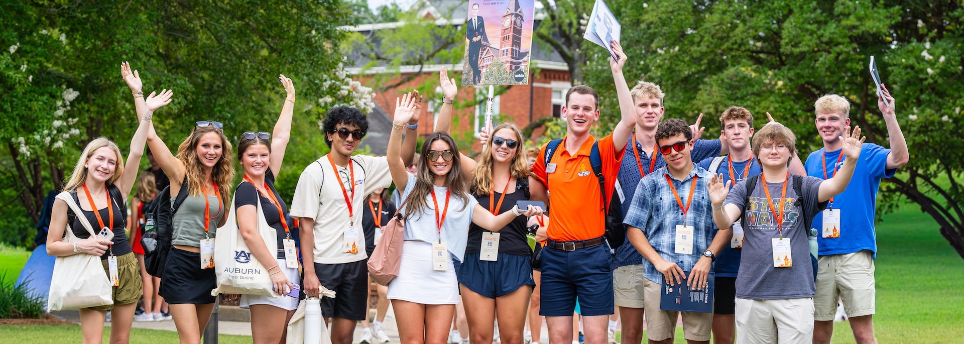 camp war eagle counselors waving to the camera