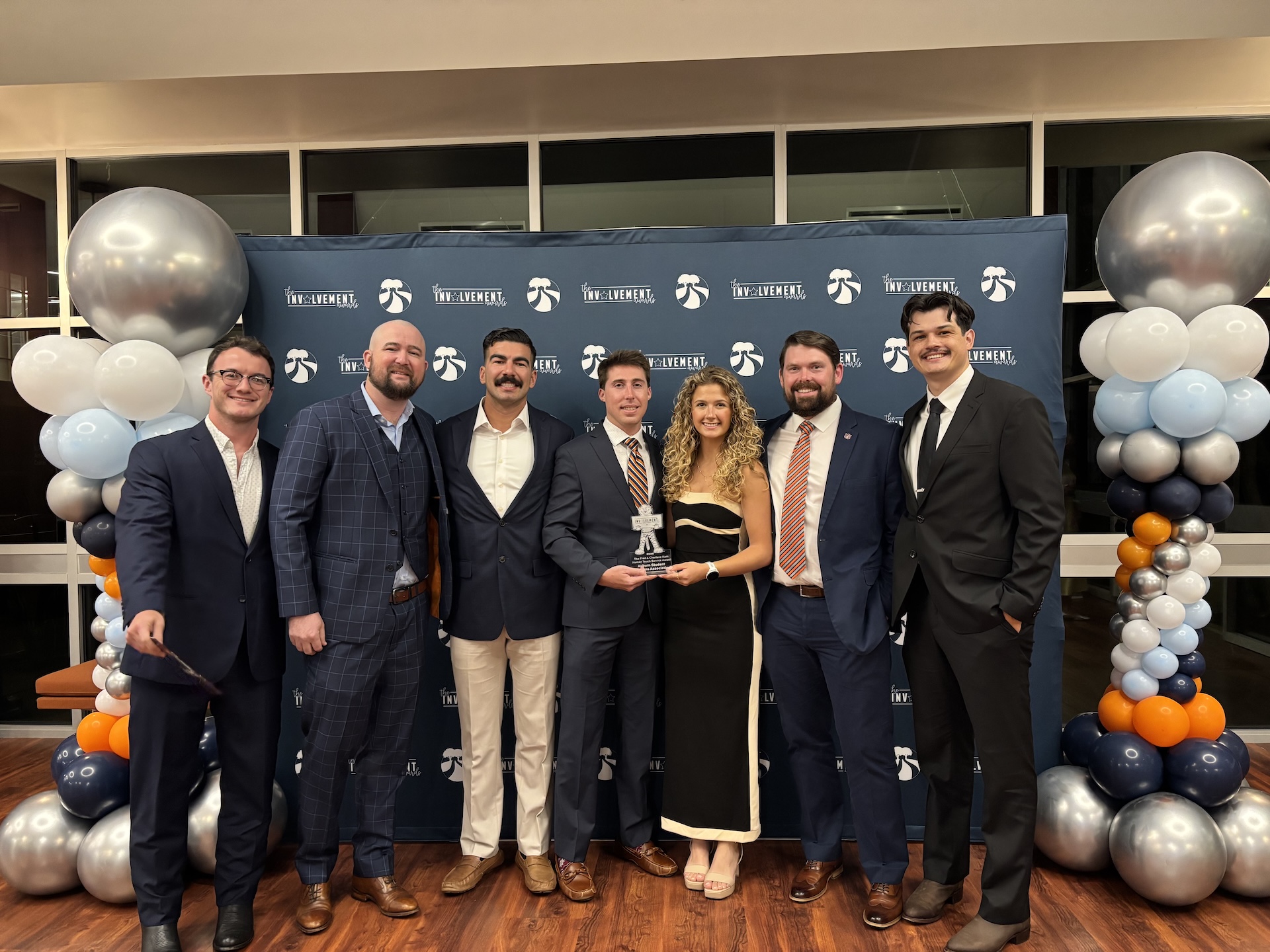 ASVA members pose with the Fred & Charlene Kam "Human Touch" Service award